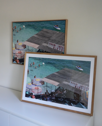 Here is our two options side by side, framed canvas (top) compared to framed fine art paper material (bottom).
